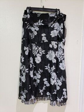 Requirements black and light gray floral, zebra lined, modest skirt, size 10